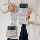 Gentle Ripple Moon Phone Case With Wristband For Samsung Galaxy Z Flip3 Flip4 5G - {{ shop_name}} varyfun
